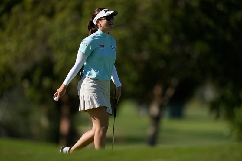 Hannah Green reacts after making a putt on the 13th green during the third round of the LPGA's JM Eagle LA Championship golf tournament at Wilshire Country Club, Saturday, April 27, 2024, in Los Angeles. (AP Photo/Ashley Landis)