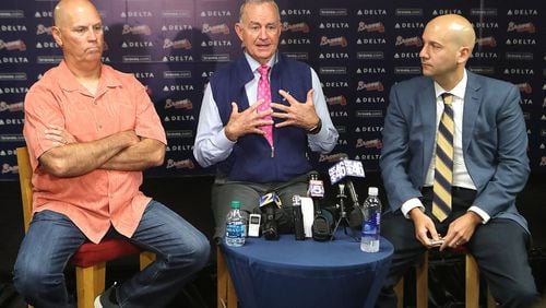 Braves interim manager Brian Snitker (from left), president of baseball operations John Hart, and general manager John Coppolella discuss the 2016 season and the process of selecting a manager for the 2017 season on Monday, Oct. 3, 2016, in Atlanta. (Curtis Compton/ccompton@ajc.com)
