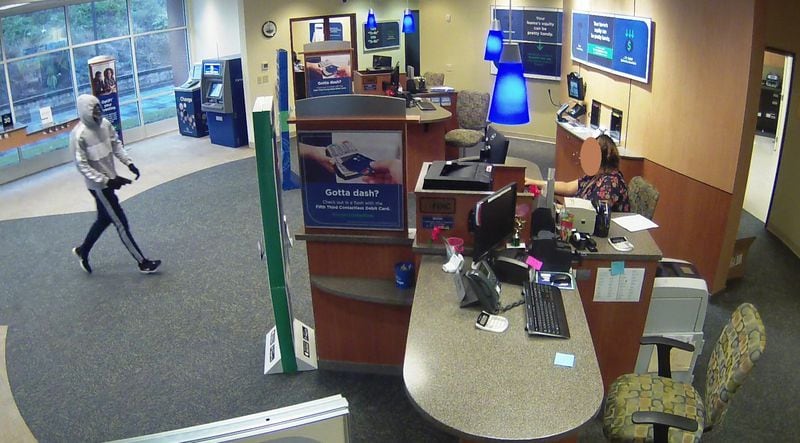 Marietta police are investigating an armed robbery reported Wednesday at Fifth Third Bank on Cobb Parkway South.