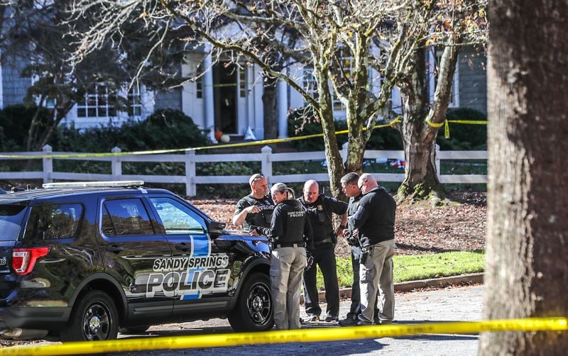 A man was shot in the living room of a home on Cameron Glen Drive after attacking a Sandy Springs police officer with a knife, according to authorities.