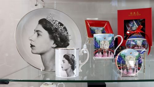 Taste of Britain in Norcross is the go-to place for anything British. With the death of Queen Elizabeth, it’s also a place where shoppers can buy an array of queen-themed merchandise. (Jason Getz / Jason.Getz@ajc.com)