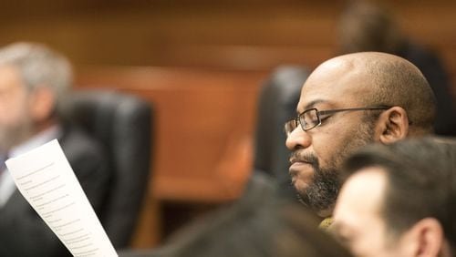 03/05/2018 — Atlanta, GA — Fulton County Chief Assistant District Attorney Clint Rucker reads over notes during the first day of jury selection for the Tex McIver case before Fulton County Chief Judge Robert McBurney on Monday, March 5, 2018. ALYSSA POINTER/ALYSSA.POINTER@AJC.COM