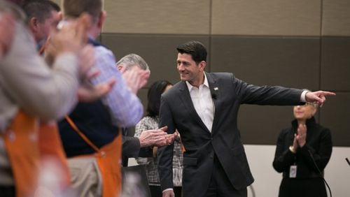 Home Depot employees applaud U.S. House Speaker Paul Ryan during a visit to the Home Depot Store Support Center earlier this month. (Photo by Jessica McGowan/Getty Images)