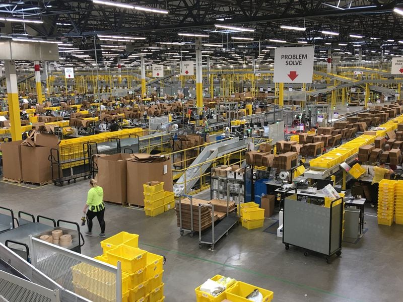 A look inside the Amazon fulfillment center in Etna. The online giant is looking to hire thousands of workers in Ohio. On Wednesday, state officials approved tax incentives for Amazon to open a new fulfillment center in a Monroe industrical park off Interstate 75, which will add 1,000 new jobs. KARA DRISCOLL/STAFF