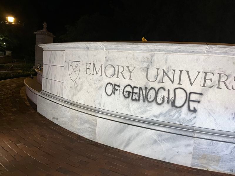 Emory University's sign was vandalized with graffiti overnight Sunday. April 29, 2024