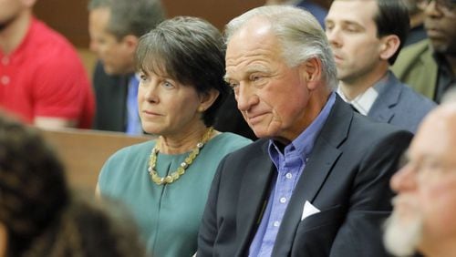 Waffle House chairman Joe Rogers Jr. (right), and his wife, Fran, react to the verdicts in Fulton County Superior Court on Wednesday, April 11, 2018. Jurors decided that a sex video involving Rogers was not recorded illegally and acquitted all three defendants. (Bob Andres bandres@ajc.com)