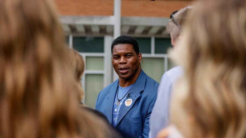 Republican U.S. Senate candidate Herschel Walker talks to news media after voting at Sutton Middle School on Tuesday, May 24, 2022. (Natrice Miller / natrice.miller@ajc.com)