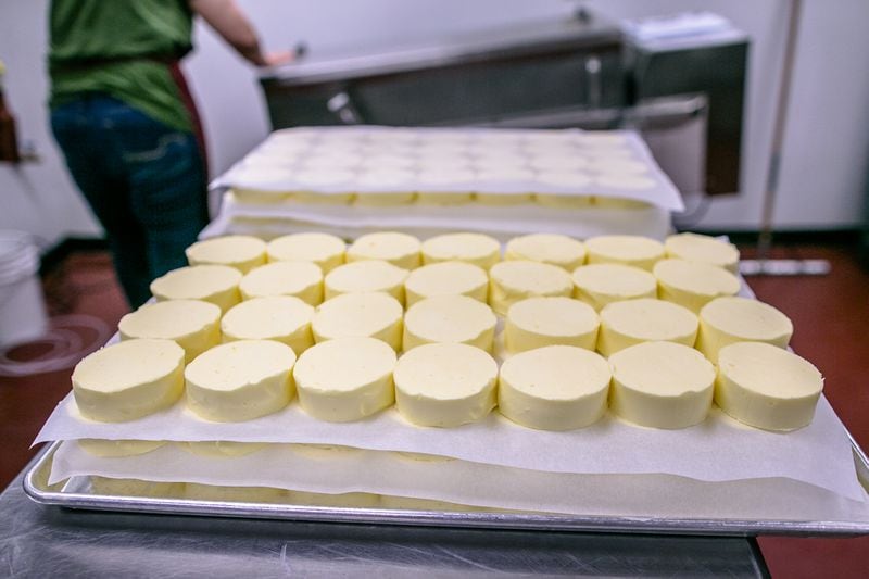 The finished butter - cut, formed and stacked for wrapping. (Photo credit: Erik Meadows Photography)