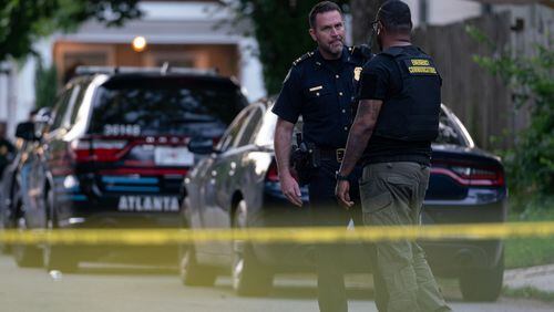 Three Atlanta police officers are recovering Sunday after being shot in the Capital View neighborhood in the 1400 block of Desoto Avenue on Saturday afternoon. (Ben Hendren for the Atlanta Journal Constitution)