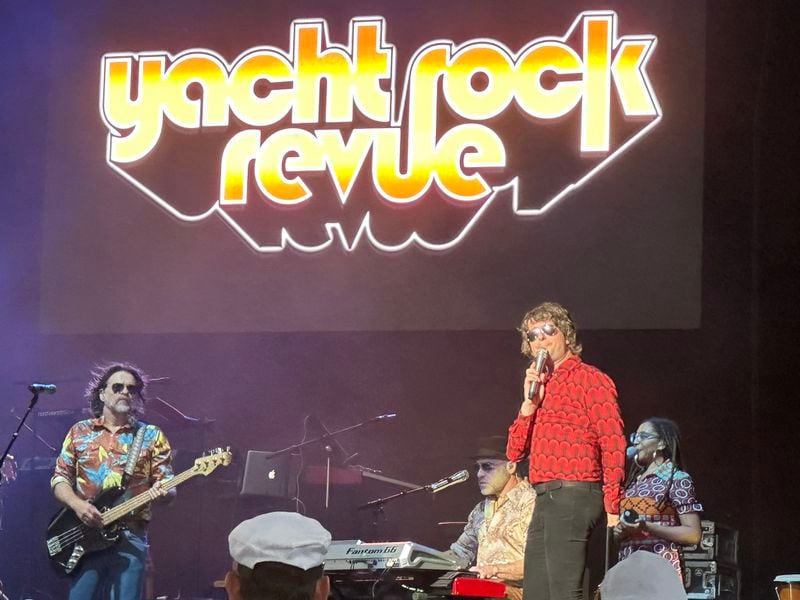 Yacht Rock Revue played a 12-song set to open for Kenny Loggins including hits by Christopher Cross, Hall & Oates and Boz Scaggs. RODNEY HO/rho@ajc.com