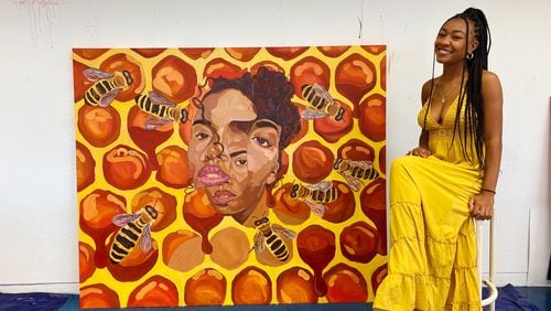 Howard University senior Kendall Robinson of Suwanee with art she painted for the movie "Candyman."
Courtesy Kendall Robinson
