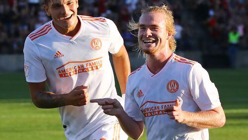 June 6, 2018 Kennesaw: Atlanta United midfielder Andrew Carleton (right) celebrates his goal against Charleston Battery with teammate Brandon Vazquez for a 1-0 lead during the first half in a U.S. Open Cup match on Wednesday, June 6, 2018, in Kennesaw.  Curtis Compton/ccompton@ajc.com