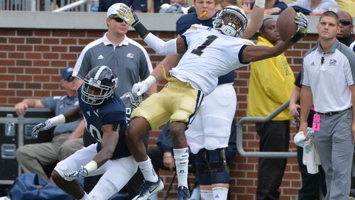 October 15, 2016 Atlanta - Georgia Tech running back Qua Searcy (1) is not able to catch a pass under pressure from Georgia Southern cornerback Jessie Liptrot (30) in the first half at Bobby Dodd Stadium on Saturday, October 15, 2016. HYOSUB SHIN / HSHIN@AJC.COM