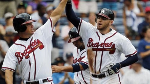 Retired Braves third baseman Chipper Jones (left) and Freddie Freeman were teammates early in Freeman’s career, and Jones has been proud watching Freeman develop into an MVP-candidate type of player. (AP file photo)