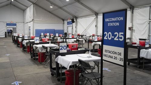 Vaccination stations in a tent at the United Center COVID-19 vaccination site in Chicago on March 8, 2021. (E. Jason Wambsgans/Chicago Tribune/TNS)