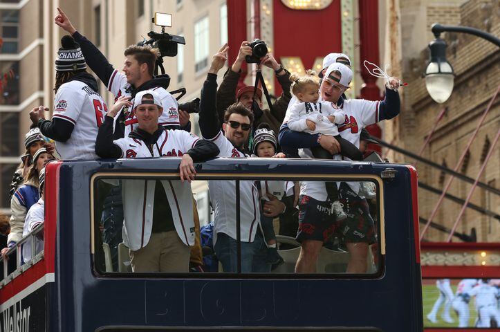 The Braves' Joc Pederson swings his pearls during the Braves' World Series parade in Atlanta, Georgia, on Friday, Nov. 5, 2021. (Photo/Austin Steele for the Atlanta Journal Constitution)