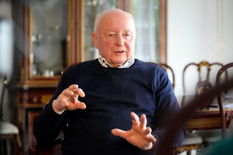 Holocaust survivor Herbert Rubinstein talks during an interview with The Associated Press at his home in Duesseldorf, Germany, Thursday, April 25, 2024. Holocaust survivors from around the globe participating in a new digital campaign called "#CancelHate" which features videos of them reading Holocaust denial posts from different social media platforms. (AP Photo/Martin Meissner)