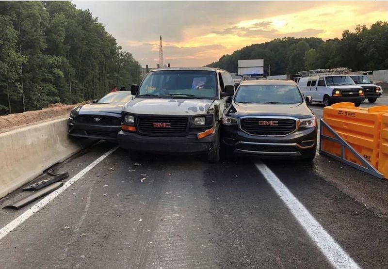 Sandy Springs police recently posted this photo of a three-vehicle-squeeze at the Glenridge Drive exit off I-285. The SUV on the right made an ill-fated, last-minute decision to exit, causing a chain-reaction wreck. No one was hurt.