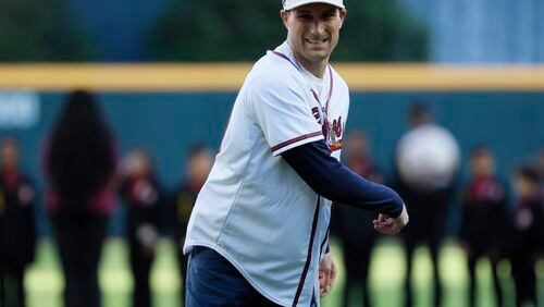 Atlanta Falcons quarterback Kirk Cousins throws out the first pitch at Truist Park prior to the game between Atlanta Braves face the Texas Rangers on Sunday, April 21, 2024.
(Miguel Martinez/ AJC)