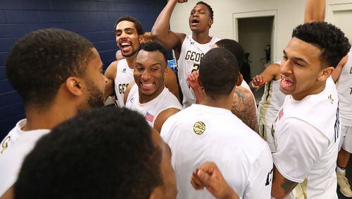 March 19, 2017, Atlanta: Georgia Tech players celebrate their 71-57 victory over Belmont in the locker room after their NIT tournament round two NCAA basketball game on Sunday, March 19, 2017, in Atlanta. Curtis Compton/ccompton@ajc.com