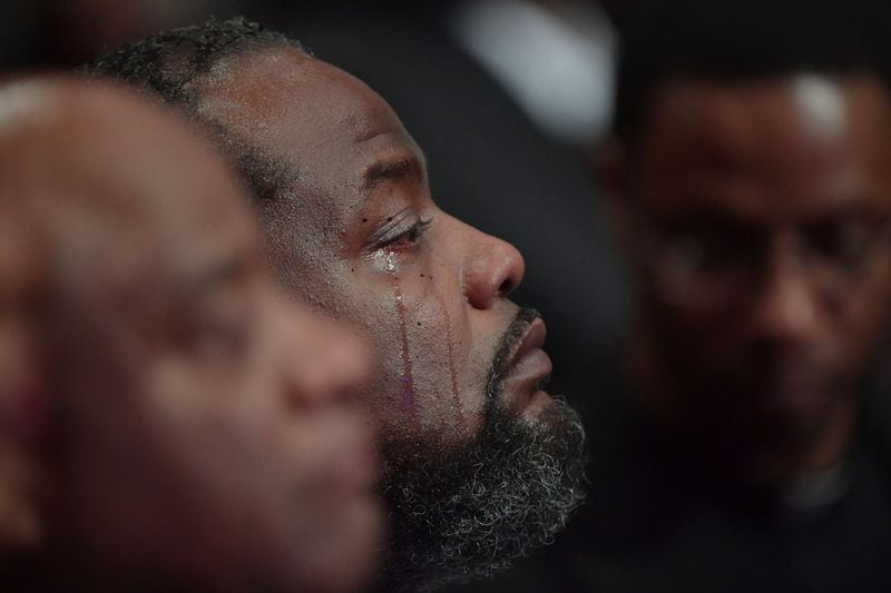 A mourner reacts during the homegoing services for Bishop Eddie Long, senior pastor at New Birth Missionary Baptist Church, on Wednesday, Jan. 25, 2017. Long died Jan. 15 after a fight with cancer. Long was 63. HYOSUB SHIN / HSHIN@AJC.COM