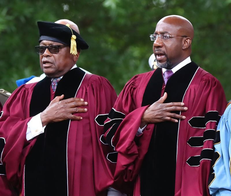 U.S. Rep. Raphael Warnock, D-Georgia, (right) will deliver several commencement addresses this month. He is pictured with U.S. Rep. James Clyburn, D-S.C. (left), at Morehouse College in 2022.