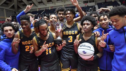 Chattahoochee players celebrate their victory over Lanier during 2020 GHSA State Basketball Class Championship game at the Macon Centreplex in Macon on Saturday, March 7, 2020. Chattahoochee won over Lanier 69-66 in overtime.(Hyosub Shin / Hyosub.Shin@ajc.com)