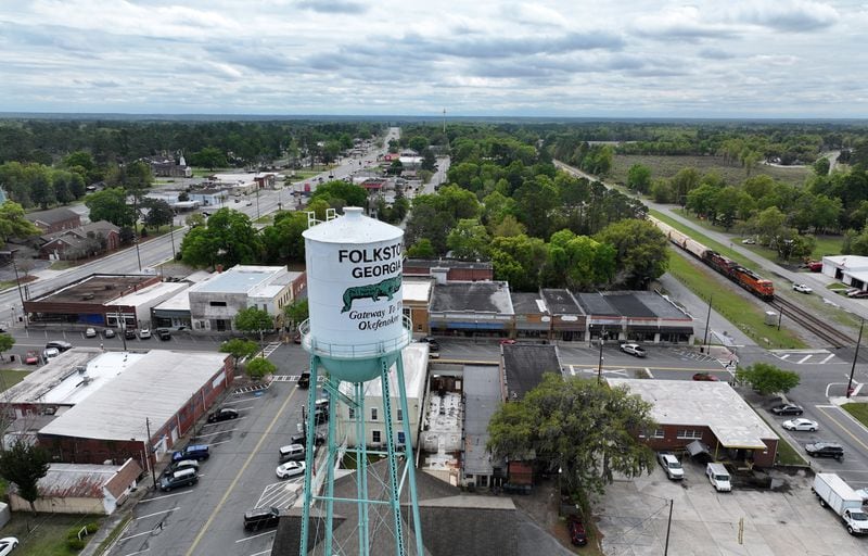 Drone photograph shows the water tank in downtown Folkston, Monday, Mar. 18, 2024. Last month, the Georgia Environmental Protection Division (EPD) released draft permits to Twin Pines Minerals for a 584-acre mine that would extract titanium and other minerals from atop the ancient sand dunes on the swamp’s eastern border, which holds water in the refuge. (Hyosub Shin / Hyosub.Shin@ajc.com)