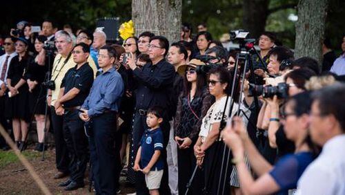 Hundreds of Chinese-Americans turned out for the funeral of 1st Lt. Robert Eugene Oxford, whose remains were returned home to Georgia last week, 73 years after a plane crash in World War II.