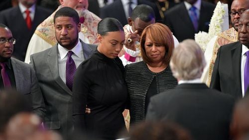 JANUARY 25, 2017  LITHONIA Family members including wife, Vanessa (right), sons  Jared and Eric and daughter Taylor, are shown during the Home-going services for Bishop Eddie Long, senior pastor, at New Birth Missionary Baptist Church, Wednesday, January 25, 2017. Bishop Long died January 15th, after a long-time fight with cancer. He was 63 years old.  Hyosub Shin/AJC
