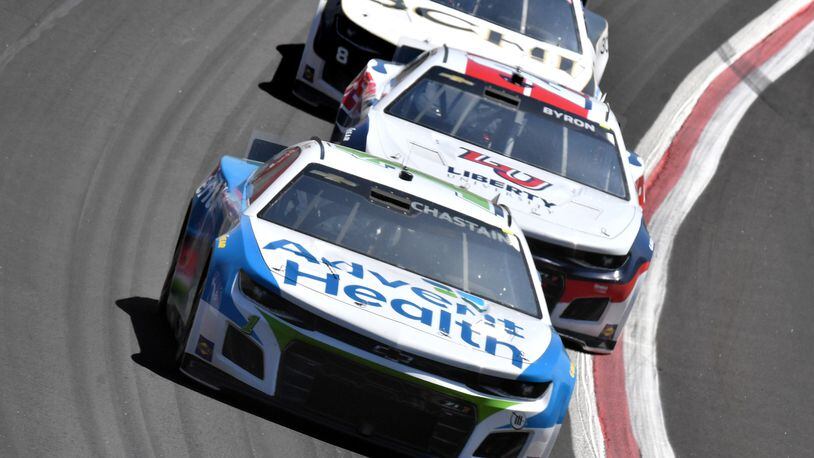 Ross Chastain leads the field during the Folds of Honor QuikTrip 500 NASCAR Cup Series Race at Atlanta Motor Speedway in Hampton on Sunday, March 20, 2022. (Hyosub Shin / Hyosub.Shin@ajc.com)
