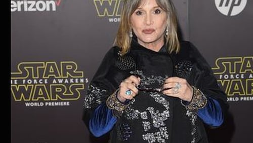 Carrie Fisher at the Hollywood premiere of "Star Wars: The Force Awakens." Photo by Jason Merritt/Getty Images)