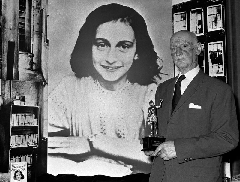 FILE - In this Monday, June 14, 1971 photo Dr. Otto Frank holds the Golden Pan award, given for the sale of one million copies of the famous paperback 'The Diary of Anne Frank' in London, Great Britain. New research suggests that the family of Anne Frank, the world-famous Jewish diarist who died in the Holocaust, attempted to immigrate to the United States and later also to Cuba, but their efforts were tragically thwarted by Americaâs restrictive immigration policy, cumbersome bureaucracy and the outbreak of World War II. Only Otto Frank survived the holocaust. (AP Photo/Dave Caulkin, file)