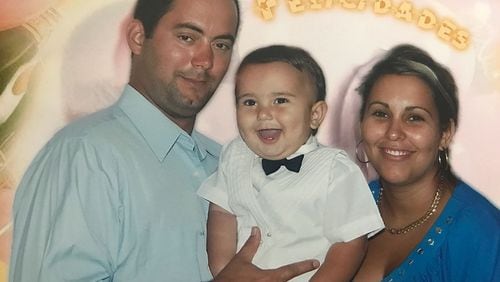 Yulio Castro Garrido with his wife, Rina, and son, Brian.
