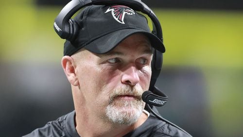 Atlanta Falcons head coach Dan Quinn looks on from the sidelines against the Miami Dolphins during the second half in a NFL preseason game on Thursday, Aug. 30, 2018, in Atlanta.