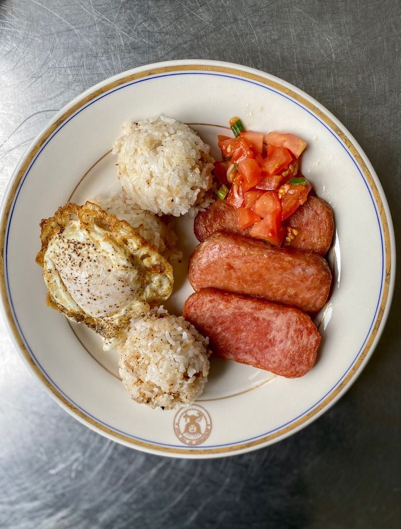 Estrellita’s Spam silog — pan-fried Spam with garlic rice, poached egg and chopped tomatoes — hit all the right notes. Wendell Brock for The Atlanta Journal-Constitution