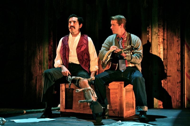 Brian Clowdus (left) plays John Wilkes Booth opposite Jeremy Wood as the Balladeer in Fabrefaction Theatre’s staging of the Stephen Sondheim musical “Assassins.” PHOTO CREDIT: BreeAnne Clowdus.