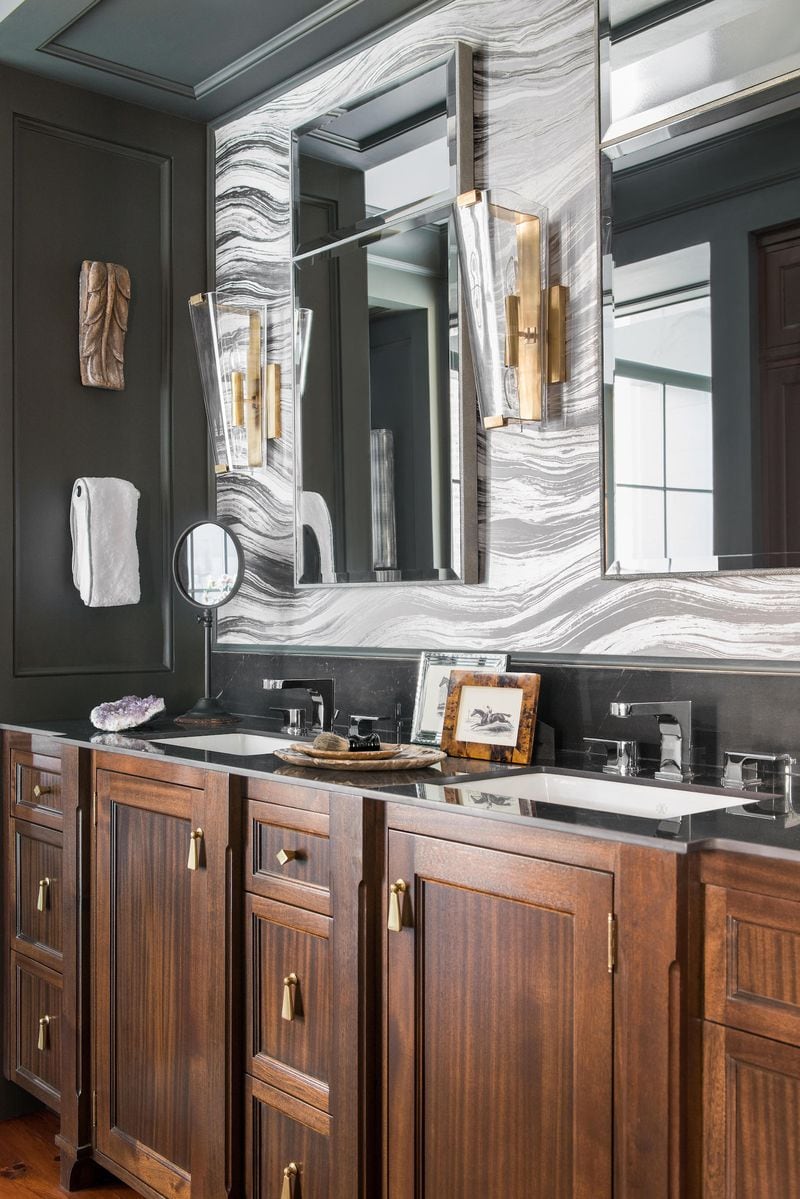 After years of black, gray and white, more interior designers are leaning into brown as a new neutral, as with this brown vanity in a bathroom designed by Terracotta Design Build.
(Courtesy of Terracotta Design Build)