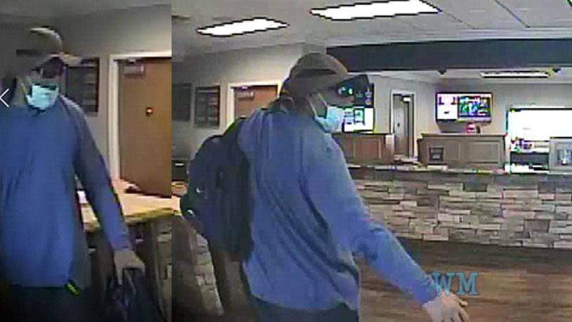 A man suspected in an armed robbery at a credit union office on Cobb Parkway was captured on security video. Acworth police are requesting help from the public finding him.