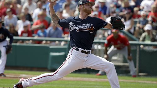 Atlanta Braves starting pitcher Mike Foltynewicz (26) throws in the first inning against the St. Louis Cardinals in a spring training baseball game, Tuesday, Feb. 28, 2017, in Kissimmee, Fla. (AP Photo/John Raoux)