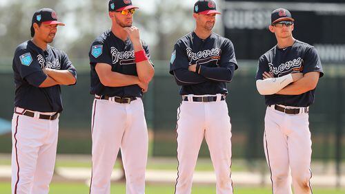 Braves catchers Kurt Suzuki (from left), Tyler Flowers, Chris Stewart, and Rob Brantley. Stewart or Brantley could be on the opening-day roster as a third catcher behind the regular tandem of Flowers and Suzuki.