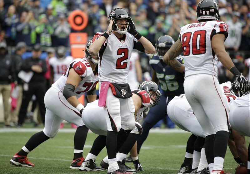 Atlanta Falcons quarterback Matt Ryan (2) calls to his team in the second half of an NFL football game against the Seattle Seahawks, Sunday, Oct. 16, 2016, in Seattle. (AP Photo/Elaine Thompson)