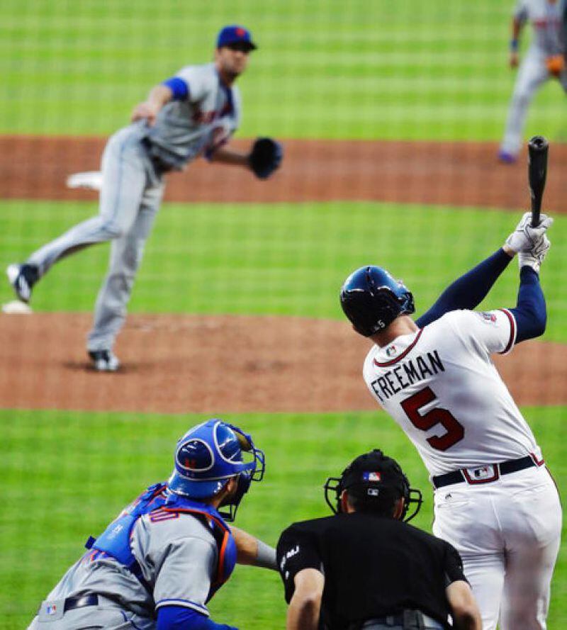  Freddie Freeman has hit four homers in the Braves' first nine games at new SunTrust Park, including this one off the Mets' Matt Harvey. (AP photo)
