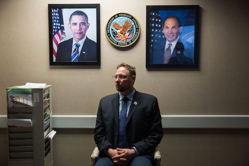 Matt Eitutis, acting executive director of member services for Veterans Affairs, poses for a portrait at the VA’s crisis hotline call center in Atlanta, Tuesday, Dec. 13, 2016. BRANDEN CAMP / SPECIAL
