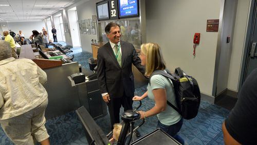 Mike Morisi, president of PEOPLExpress welcomes passengers arriving at Hartsfield-Jackson Atlanta International Airport from Newport News-Williamsburg International Airport on Aug. 1. After nearly 30 years PEOPLExpress hopes to return to Atlanta.