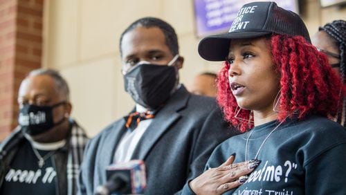 Venethia Cook-Lewis speaks at a news conference Friday about her family's plans to file a $50 million lawsuit against Cobb County following the fatal police shooting of her 17-year-old son, Vincent Truitt, last summer.