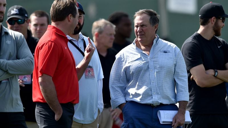March 16, 2106 Athens, GA: Georgia head coach Kirby Smart, left chats with New England Patriots head coach Bill Belichick during  Pro Day at the University of Georgia Wednesday March 16, 2016.  Players,  who have wrapped up their college careers,  participated in a set of predetermined skills designed to test their strength, speed and agility in hopes of impressing NFL scouts.     BRANT SANDERLIN/BSANDERLIN@AJC.COM