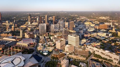 California-based developer CIM Group wants to build a 40-acre mixed-use project on top of the railroad lines and parking lots between Mercedes-Benz Stadium, left, and the Five Points MARTA station. CIM plans to re-brand the Gulch as Centennial Yards to reflect the site’s proximity to Centennial Olympic Park and its history as a crucial rail junction in downtown. SPECIAL