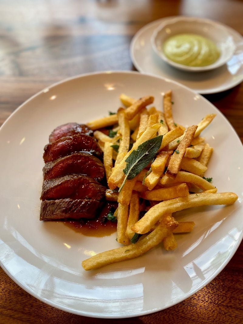 From Lucian’s lunch menu, the classic steak au poivre with fries is pretty near perfect. Wendell Brock for The Atlanta Journal-Constitution