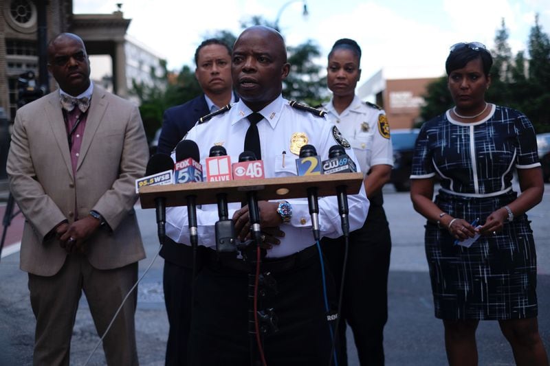 Atlanta police Chief Rodney Bryant speaks to reporters after an officer was wounded Wednesday at a Midtown apartment building.